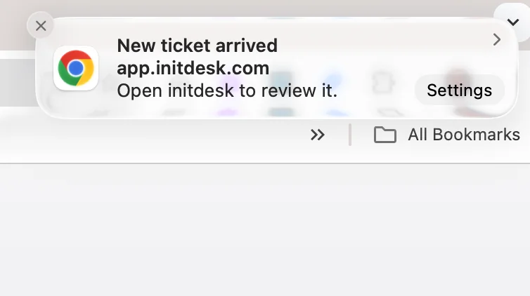 Browser push notification from initdesk showing a new ticket alert